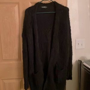 Very warm black fuzzy sweater good condition just don’t use it any more